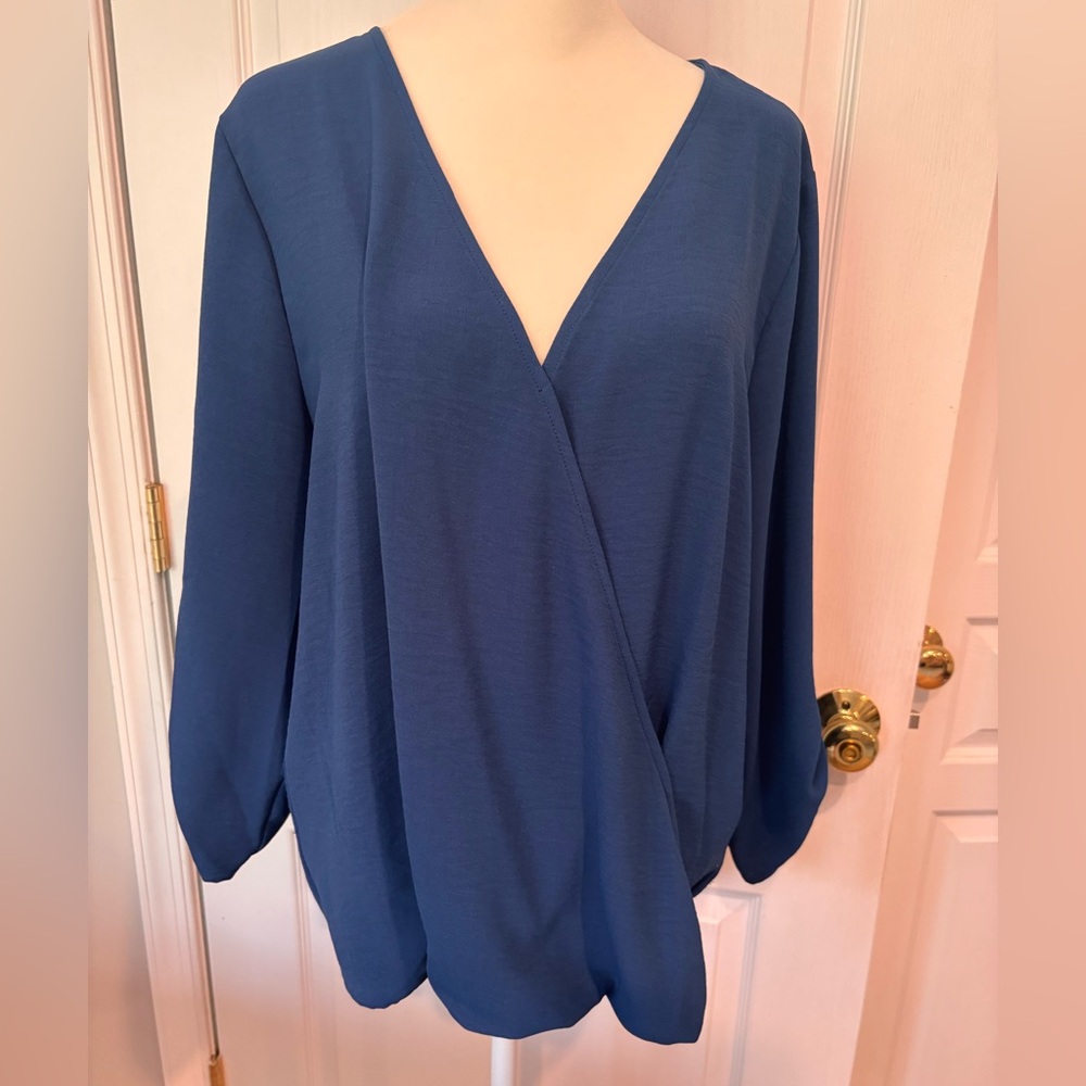 West K Surplice roll tab blouse